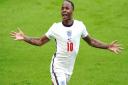 England's Raheem Sterling celebrates scoring their side's first goal of the game during the UEFA Euro 2020 round of 16 match at Wembley Stadium, London. Picture date: Tuesday June 29, 2021.