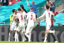 England's Raheem Sterling (left) celebrates scoring their side's first goal of the game during the UEFA Euro 2020 round of 16 match at Wembley Stadium, London. Picture date: Tuesday June 29, 2021.