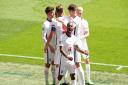 Raheem Sterling celebrates scoring England's goal with team-mates during the UEFA Euro 2020 Group D match against Croatia.