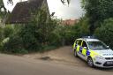 Police at the scene in Rattlesden in Suffolk.