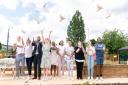Deputy council leader Cllr Dominic Twomey, Cllr Alison Cormack and mayor Cllr Faruk Choudhury join children to release doves to mark the park's opening