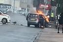 A car on fire following a crash in Valentines Way this morning (October 4).