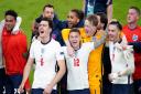England's Reece James, Bukayo Saka, Harry Maguire, Kieran Trippier, Jordan Pickford, Jack Grealish and team-mates celebrate winning the UEFA Euro 2020 semi-final match at Wembley on July 7