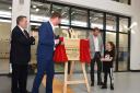 The Duke of Sussex unveils a plaque. Picture: Ken Mears