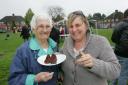 May and Jackie Calder try some of the cakes