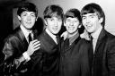 George Harrison (right) was part of the Beatles quartet