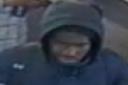 Police have released a CCTV shot of a man they want to speak with after an alleged assault on a member of rail staff at Upney Underground station