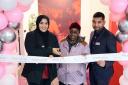 Cllr Saima Ashraf (left) cut the ribbon with contract manager Hasan Romel (right) and a Barking resident