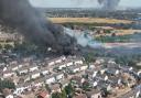 Drone picture of the blaze firefighters are fighting in Dagenham while they urge people to keep windows closed after a man and woman were taken to hospital suffering smoke inhalation