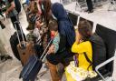 Evacuees from Afghanistan arrive at Heathrow Airport