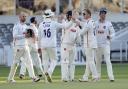 Essex players celebrate a wicket against Middlesex at Lord's
