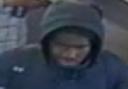 Police have released a CCTV shot of a man they want to speak with after an alleged assault on a member of rail staff at Upney Underground station