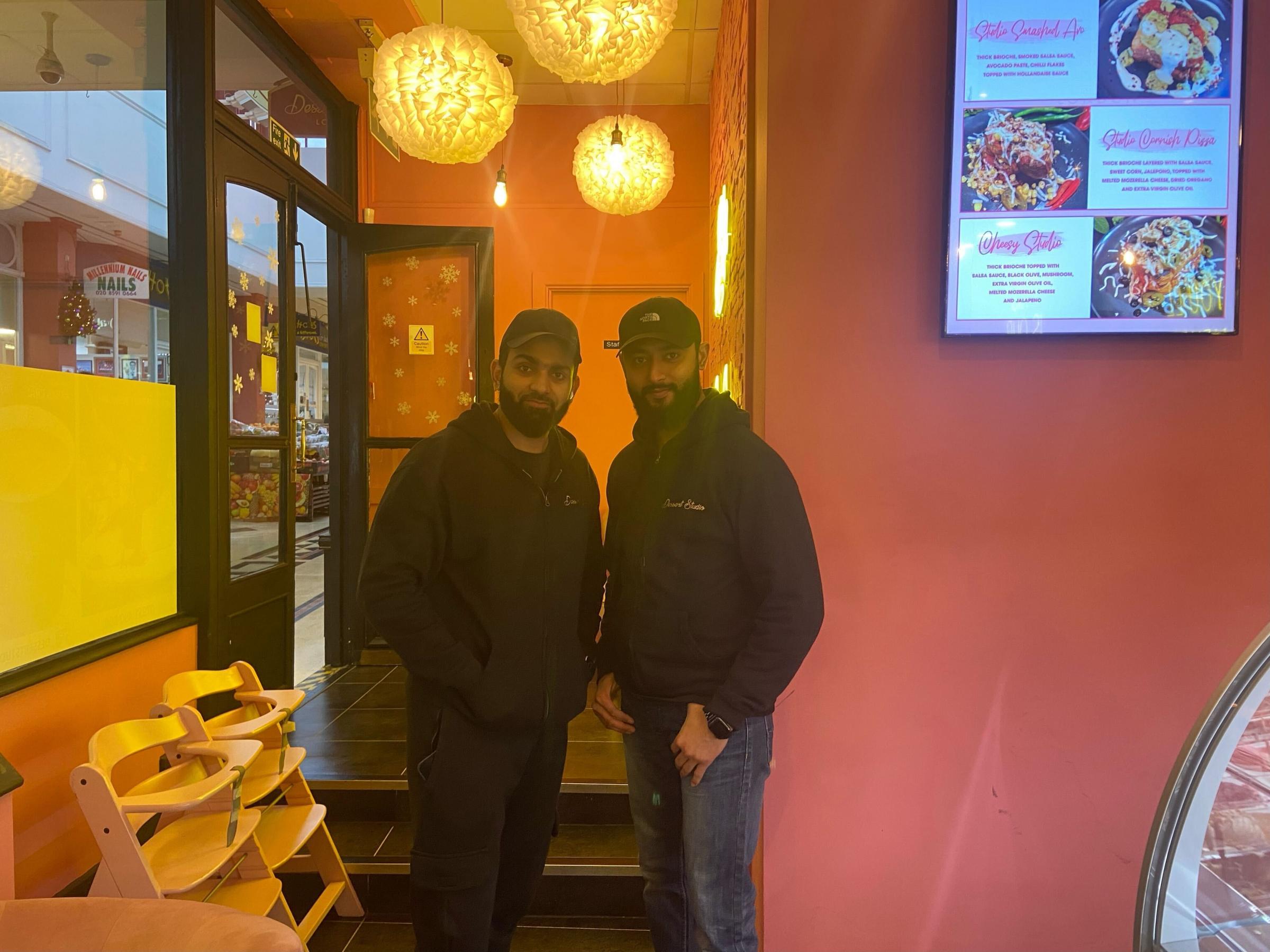 Brothers Muhammad Maaz (L) and Muhammad Shakeel (R) opened a dessert shop in the mall eight months ago