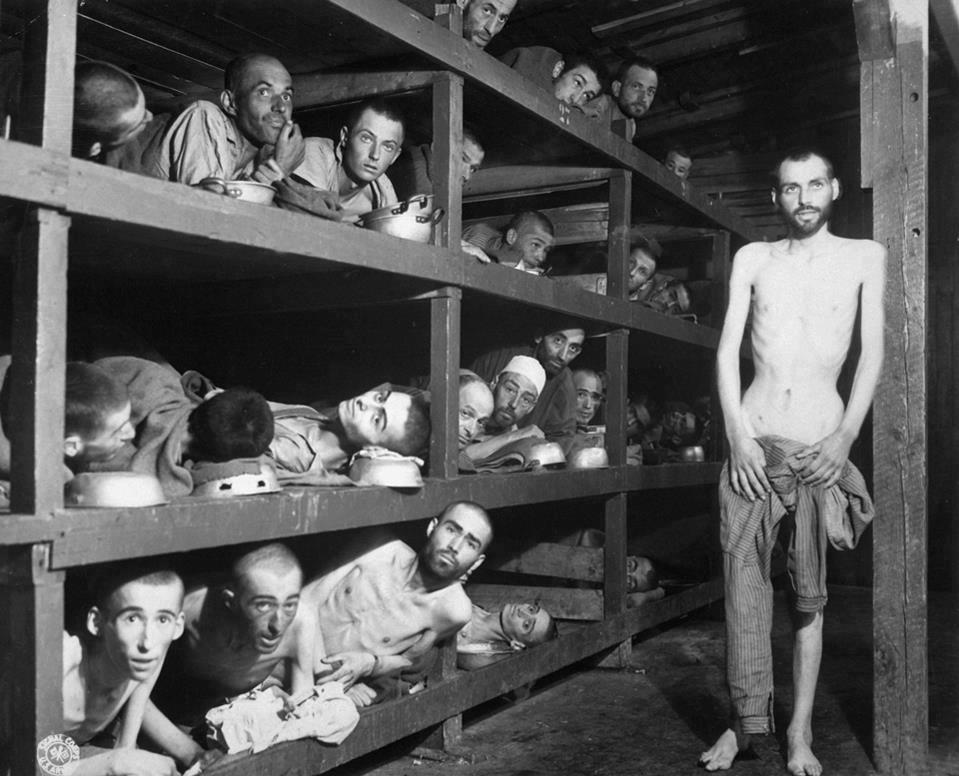 Starved inmates of Auscwitz death camp