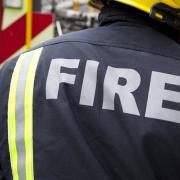 Around 60 firefighters are at the scene near Dagenham Road