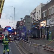 Ten fire engines and about 70 firefighters tackled a fire at a range of shops with flats above in Longbridge Road, Barking