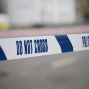 A crime scene remains in place after a man was fatally stabbed on Isle of Dogs.