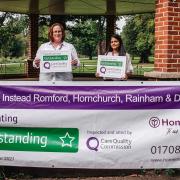 Members of the Home Instead Romford team celebrate their outstanding rating from CQC.