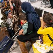 Evacuees from Afghanistan arrive at Heathrow Airport