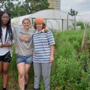 Dagenham Farm trainees Raegina Peters (left) and Gemma Cunningham (right) with farm worker Ashlea Wane.