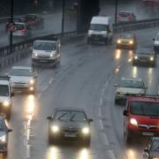 Traffic in the rain on the A406 in South Woodford.