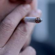 Lord George Young wants to put health warnings on every cigarette