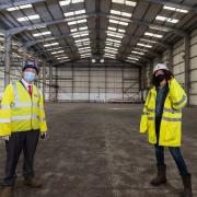 Cllr Darren Rodwell with Lisa Dee, head of Film LBBD inside one of the warehouses at The Wharf in Barking.