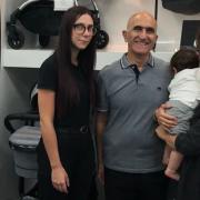 Babycare of Dagenham store manager Ellie Brand with owner Morris Shiraji and his daughter Melody, who helps out with the shop