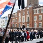 People gather outside Barking Town Hall for the civic service