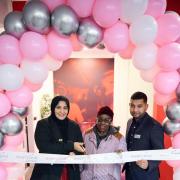 Cllr Saima Ashraf (left) cut the ribbon with contract manager Hasan Romel (right) and a Barking resident