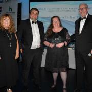 Alex Rowley's mother (second right) accepted his employee of the year accolade at the 2022 awards