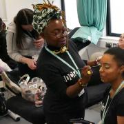 Face painting in a college beauty competition at the skills show