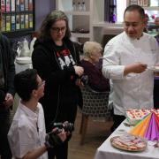 Students with cameras capture top chef Michael Kwan