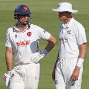 Sir Alastair Cook and Stuart Broad chat during the match between Essex and Nottinghamshire