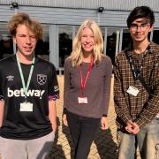 Kristin Ellingson with two Barking and Dagenham college students
