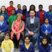 MP Margaret Hodge with headteacher James Smith and some of the 'ambassador' pupils