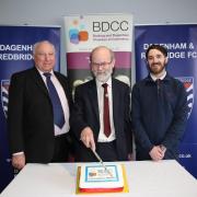 David Hall, Jamie Banks and James Wright cut the cake