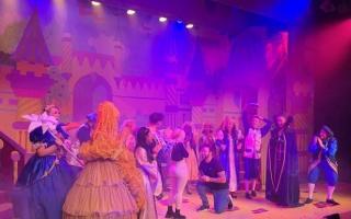 Paul proposed to Emily onstage surrounded by the cast of Snow White