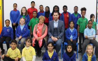 MP Margaret Hodge with headteacher James Smith and some of the 'ambassador' pupils