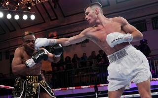 Billy Adams hits out on his professional debut. Image: Stephen Dunkley/Queensberry Promotions