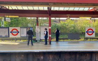 Police officers were seen on a platform at Becontree station this morning